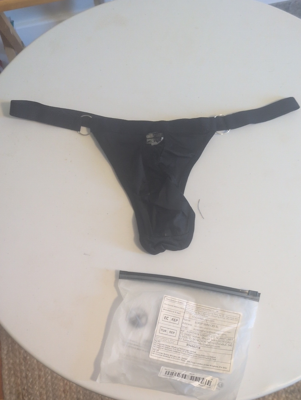 Men's Black Minimal Bikini Brief with Side Ring Accents